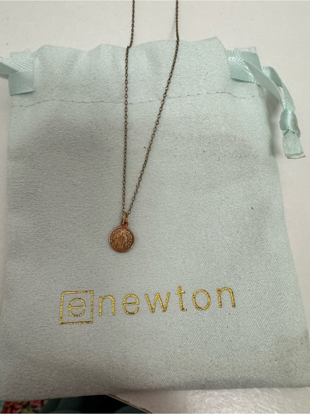 Enewton small Gold Coin Pendant Necklace, gold is discolored.